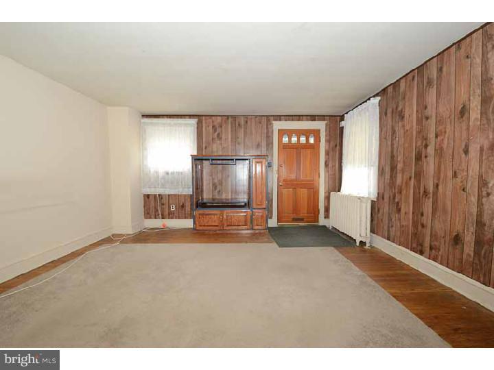 7216 Bradford Road Upper Darby, PA 19082 - Photo 9 of 25 a view of an empty room with a window