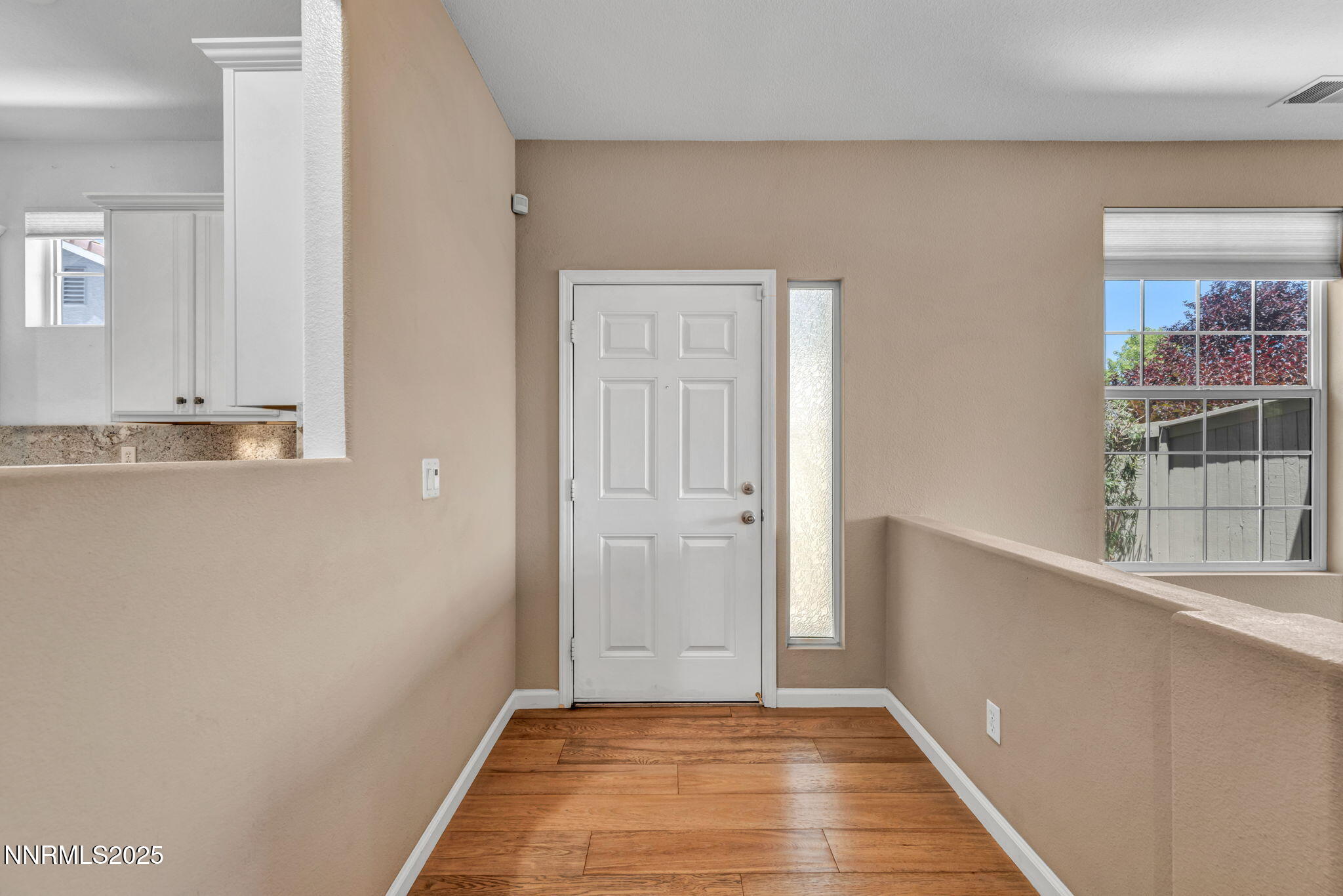 10559 Iron Point Circle Reno, NV 89521 - Photo 5 of 32 a view of an empty room and window