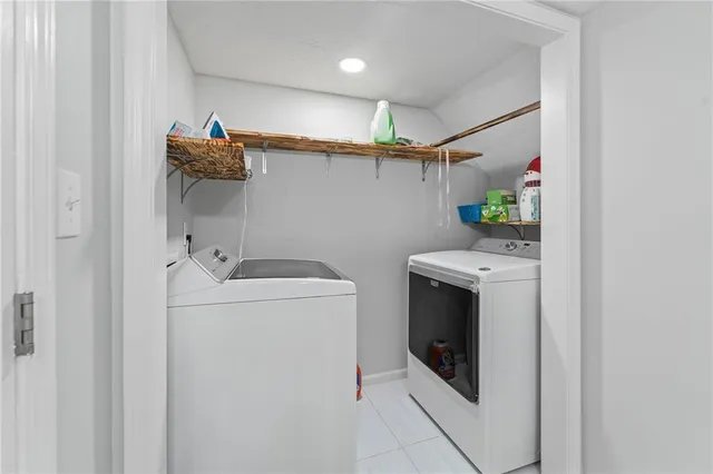 a view of a two chairs in the balcony