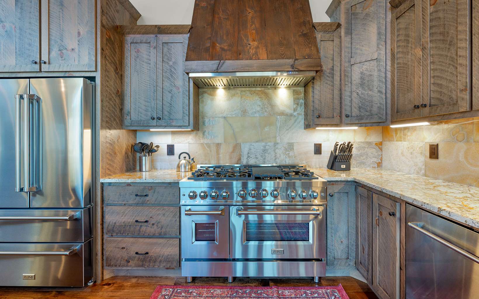 810 Overlook Drive Blue Ridge, GA 30513 - Photo 19 of 56 a kitchen with stainless steel appliances granite countertop a stove and a refrigerator