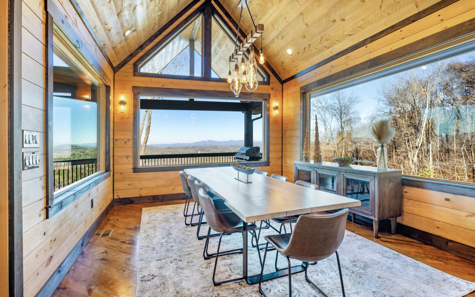 810 Overlook Drive Blue Ridge, GA 30513 - Photo 23 of 56 a dining room with furniture and a floor to ceiling window