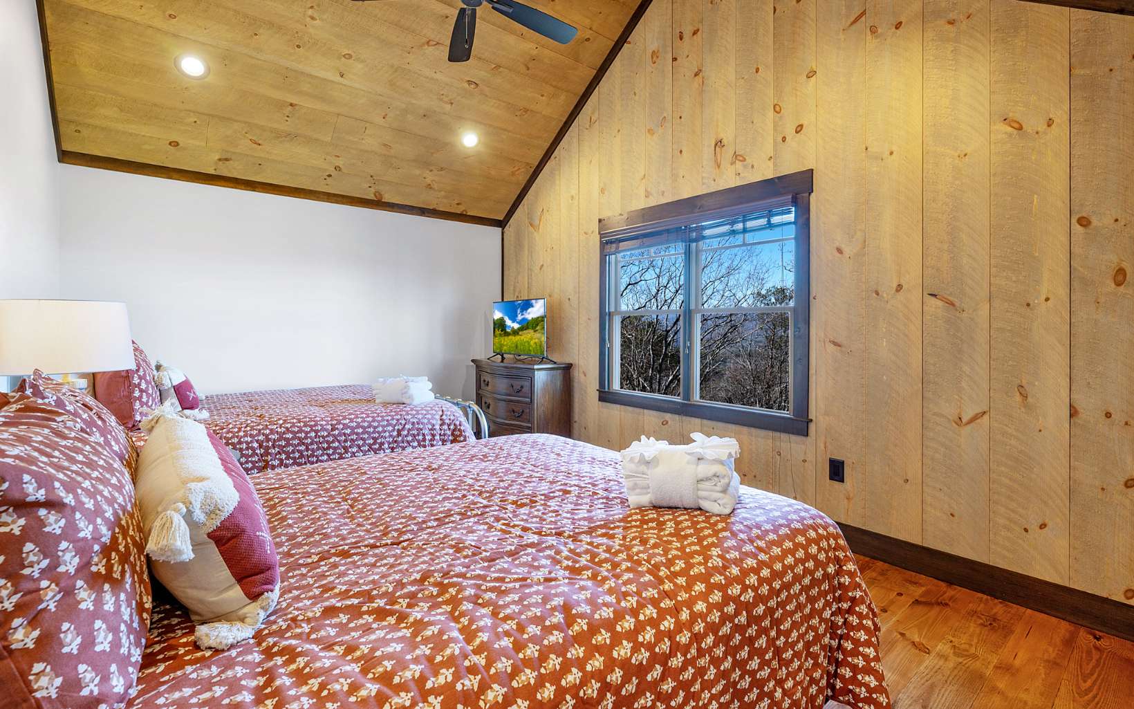 810 Overlook Drive Blue Ridge, GA 30513 - Photo 34 of 56 a bedroom with a bed and a painting on the wall