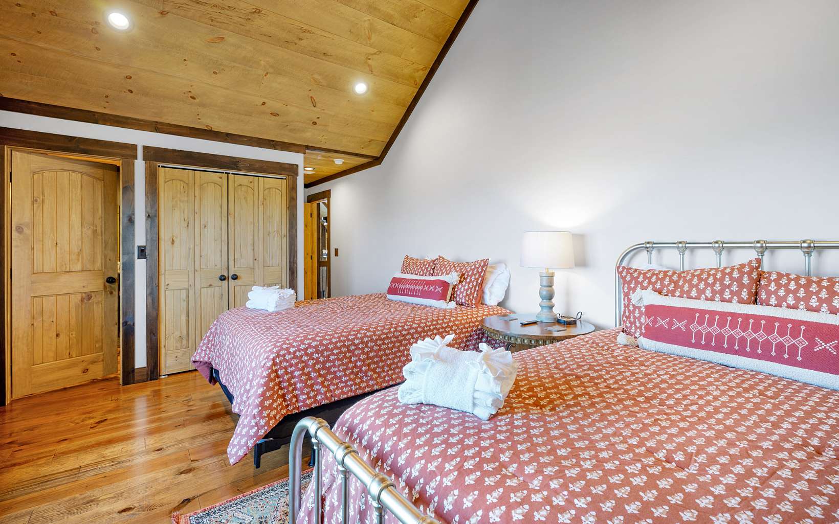 810 Overlook Drive Blue Ridge, GA 30513 - Photo 35 of 56 a bedroom with two beds and wooden floor