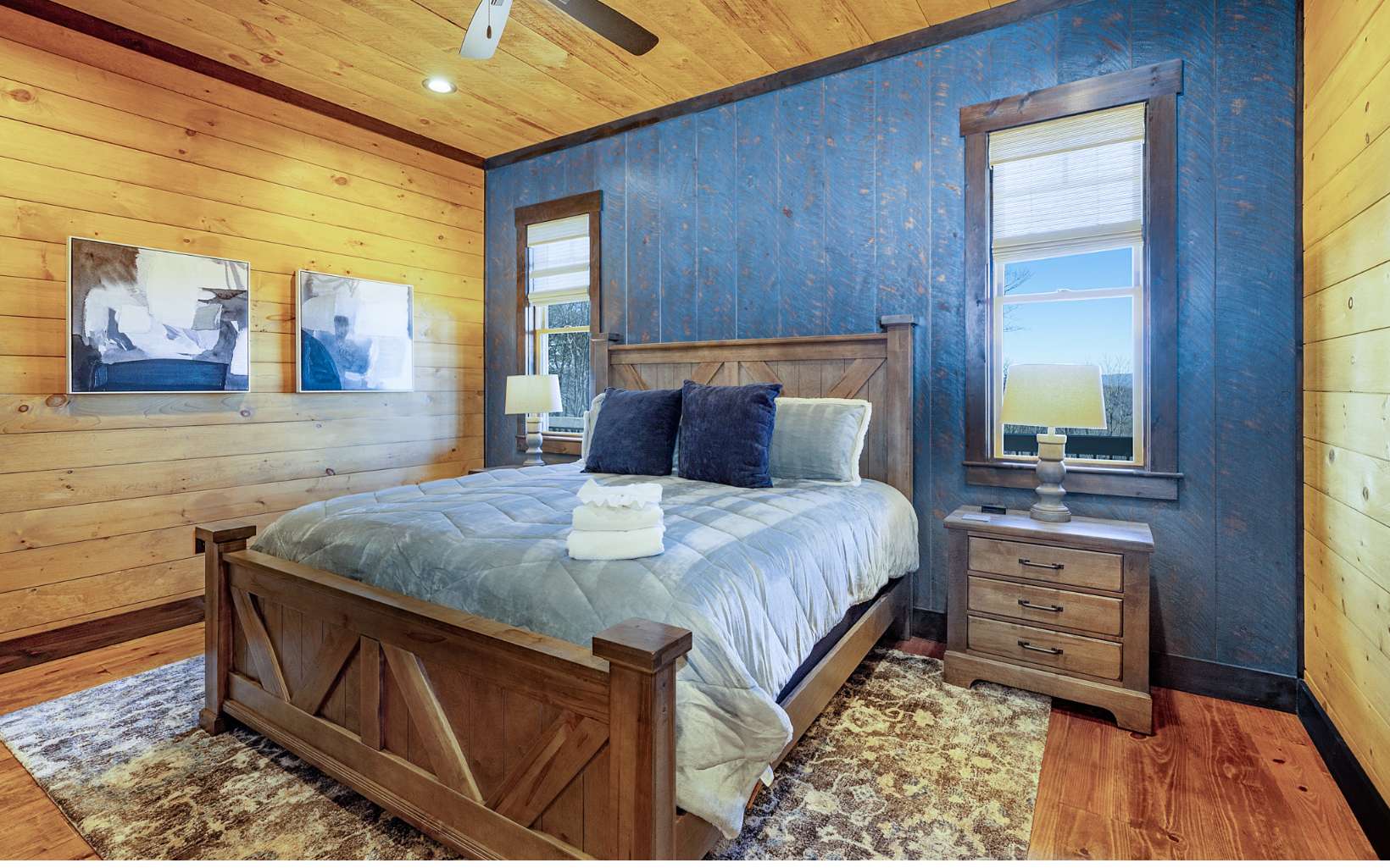 810 Overlook Drive Blue Ridge, GA 30513 - Photo 38 of 56 a bedroom with a bed and wooden floor