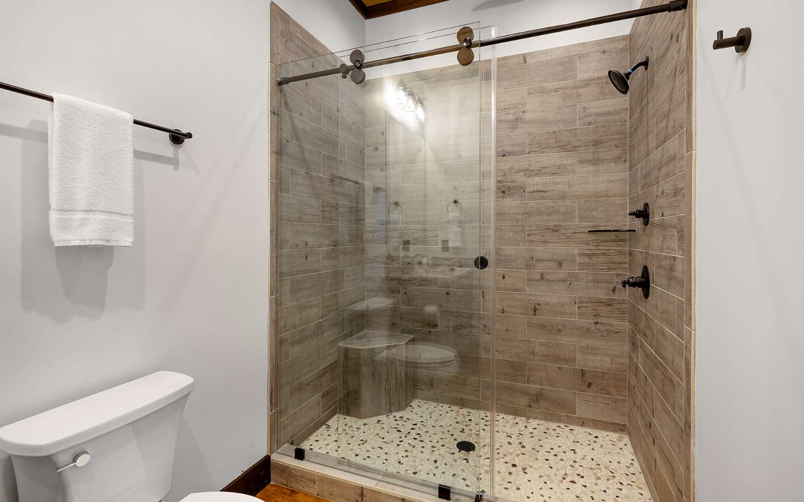 810 Overlook Drive Blue Ridge, GA 30513 - Photo 41 of 56 a bathroom with a shower and a toilet