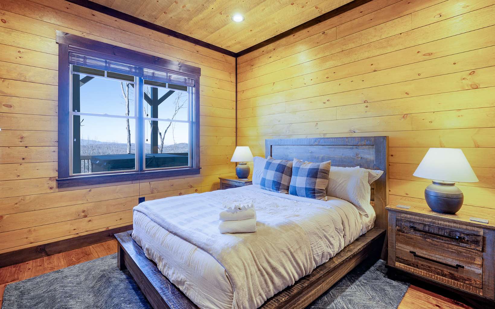 810 Overlook Drive Blue Ridge, GA 30513 - Photo 42 of 56 a bedroom with a bed and a window