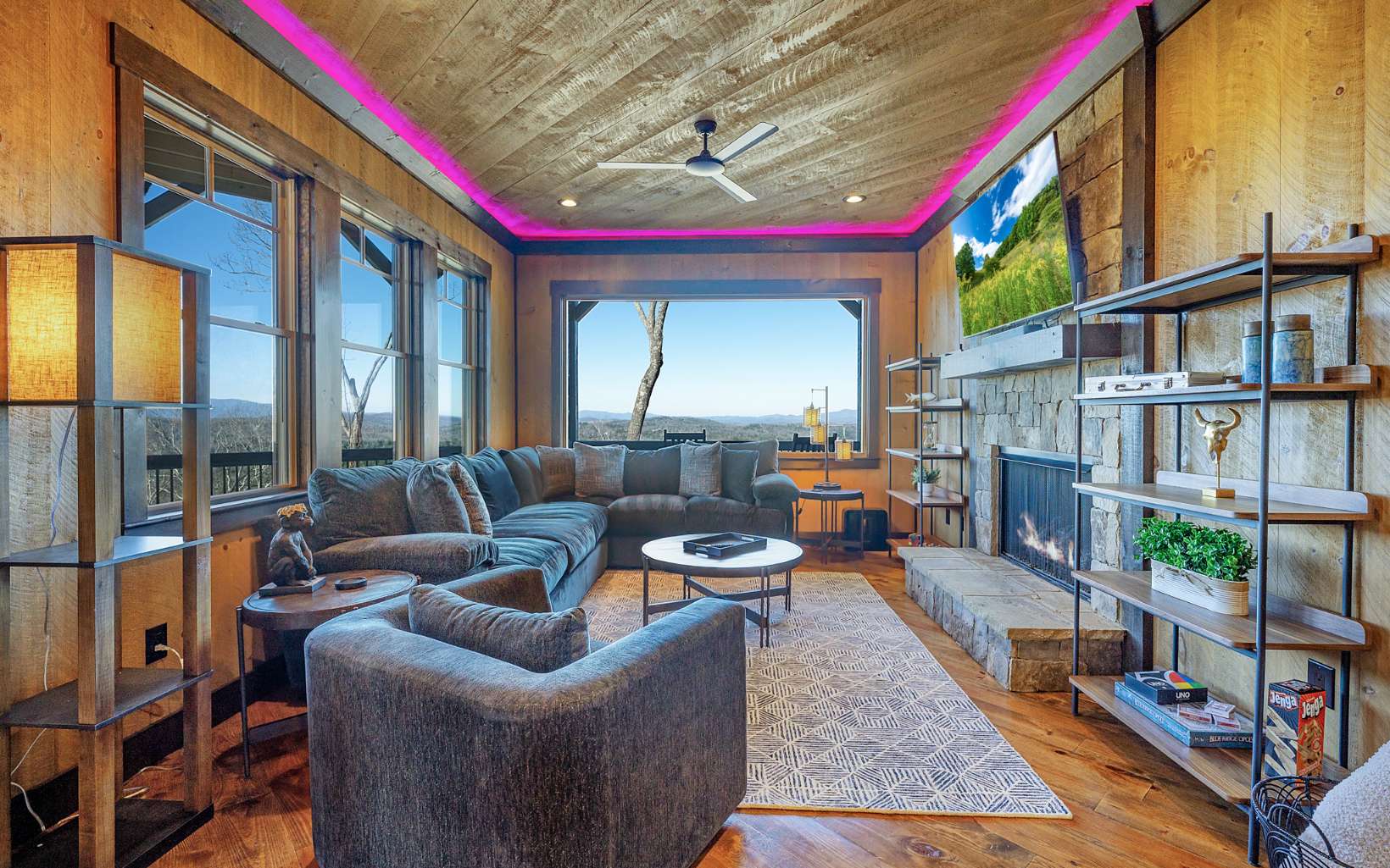 810 Overlook Drive Blue Ridge, GA 30513 - Photo 47 of 56 a living room with furniture fireplace and a large window