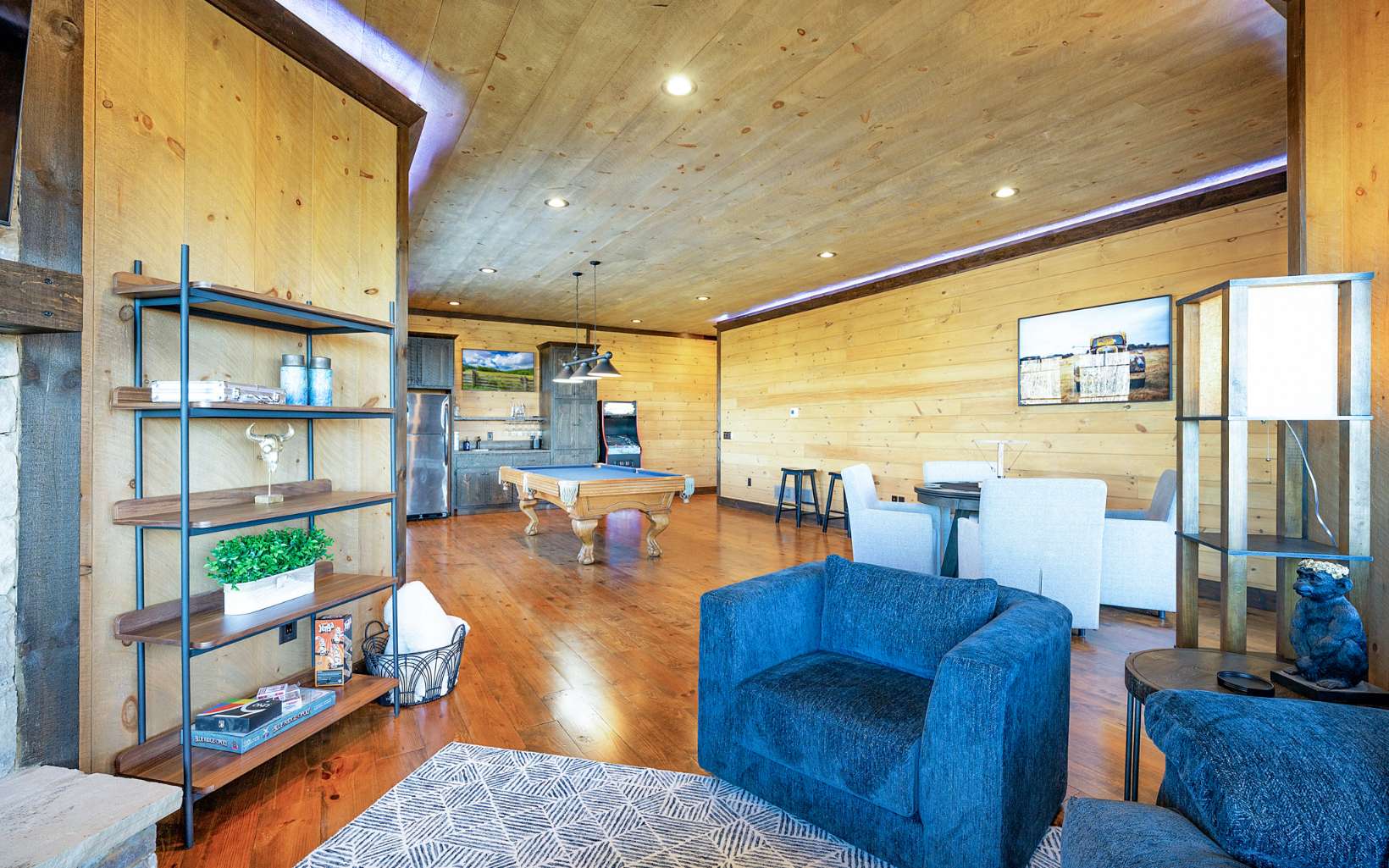 810 Overlook Drive Blue Ridge, GA 30513 - Photo 52 of 56 a living room with furniture wooden floor and a large window