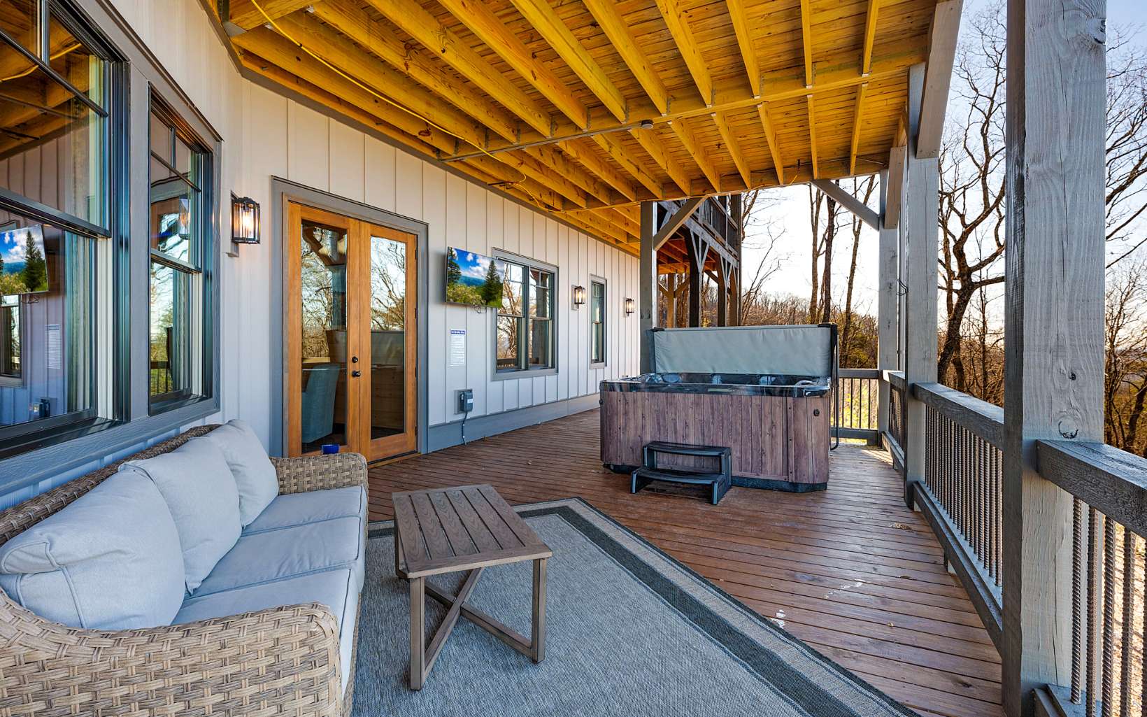 810 Overlook Drive Blue Ridge, GA 30513 - Photo 55 of 56 a balcony with furniture and wooden floor
