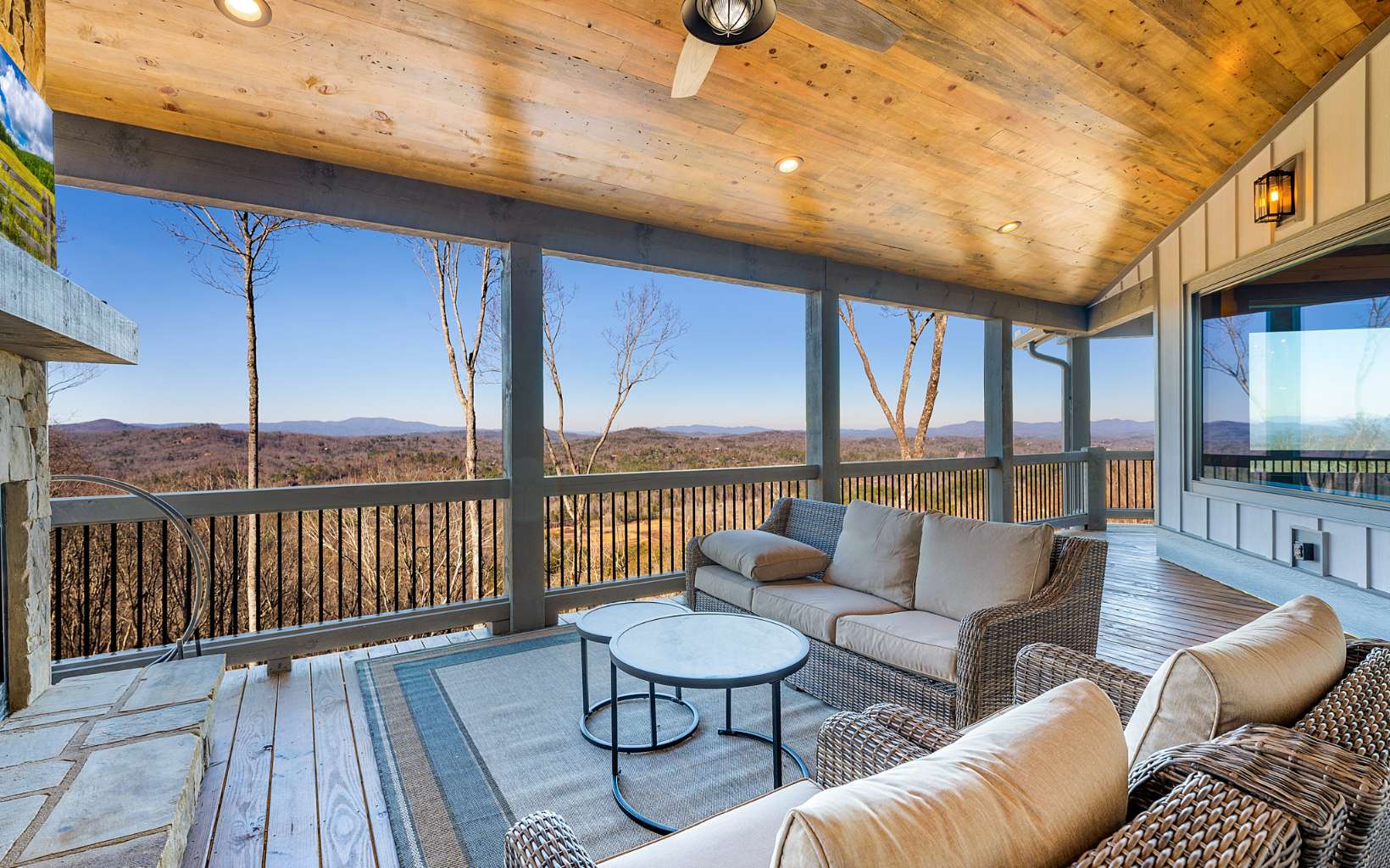810 Overlook Drive Blue Ridge, GA 30513 - Photo 7 of 56 a balcony with furniture and wooden floor
