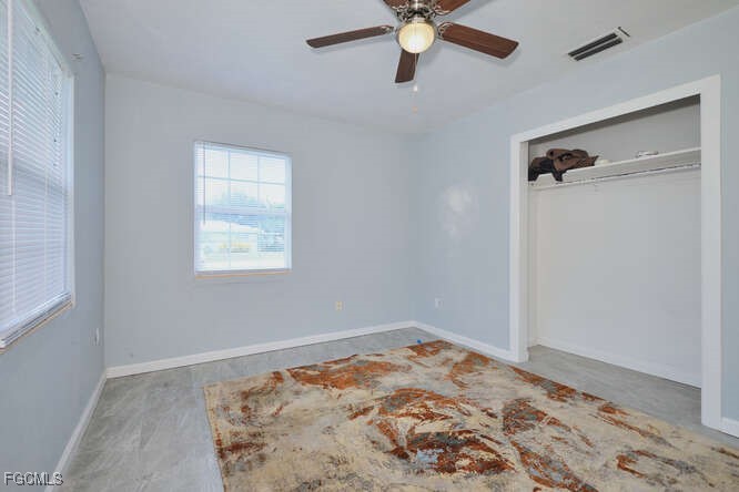 1637 Piney Road North Fort Myers, FL 33903 - Photo 19 of 41 a view of a big room with wooden floor and a window