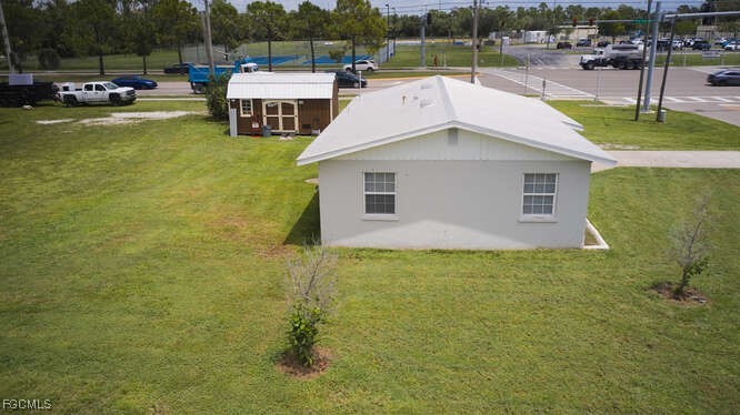 1637 Piney Road North Fort Myers, FL 33903 - Photo 24 of 41 a view of a swimming pool with a lake view