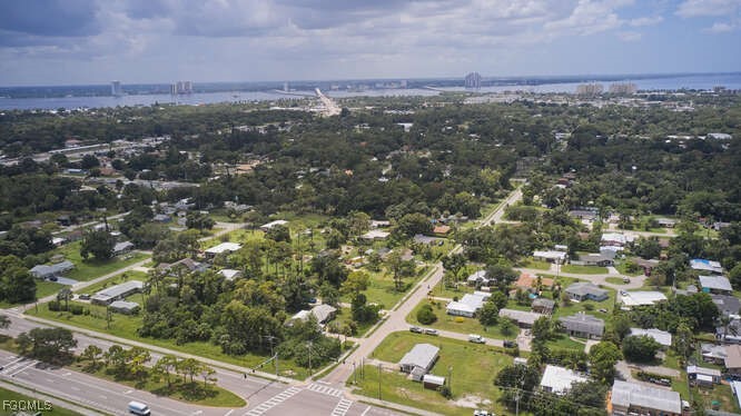 1637 Piney Road North Fort Myers, FL 33903 - Photo 30 of 41 an aerial view of residential houses with outdoor space and trees