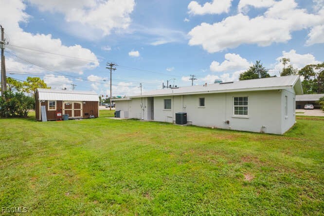 1637 Piney Road North Fort Myers, FL 33903 - Photo 34 of 41 a view of a house with a backyard