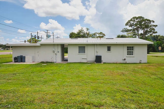 1637 Piney Road North Fort Myers, FL 33903 - Photo 35 of 41 a view of a house with a backyard