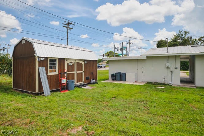 1637 Piney Road North Fort Myers, FL 33903 - Photo 36 of 41 a view of a house with backyard and porch