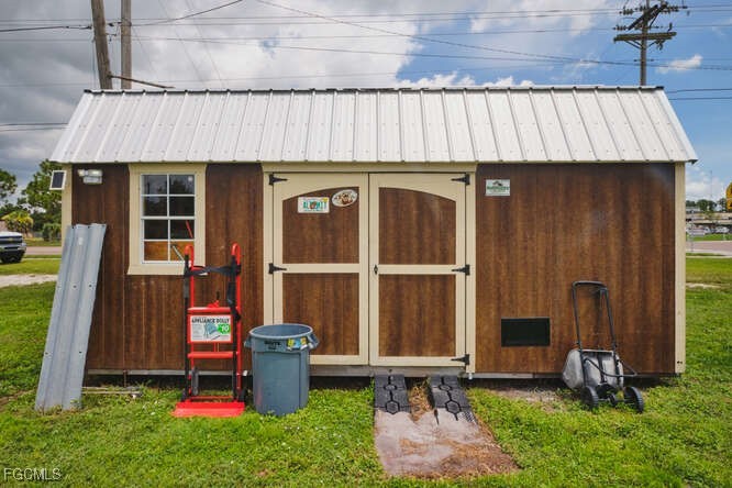 1637 Piney Road North Fort Myers, FL 33903 - Photo 38 of 41 a front view of a house with garden