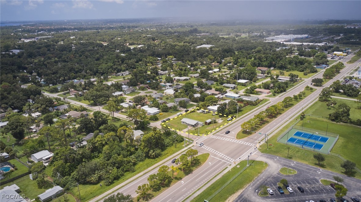 1637 Piney Road North Fort Myers, FL 33903 - Photo 40 of 41 an aerial view of residential houses with outdoor space