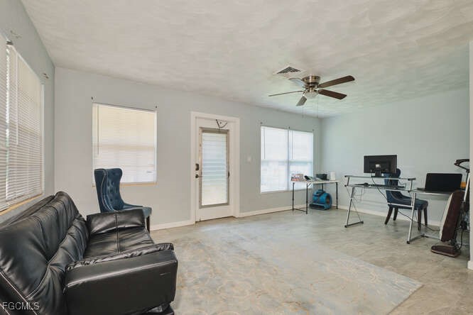 1637 Piney Road North Fort Myers, FL 33903 - Photo 4 of 41 a living room with furniture