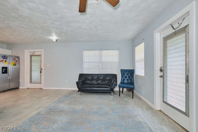 1637 Piney Road North Fort Myers, FL 33903 - Photo 6 of 41 a living room with furniture and a window