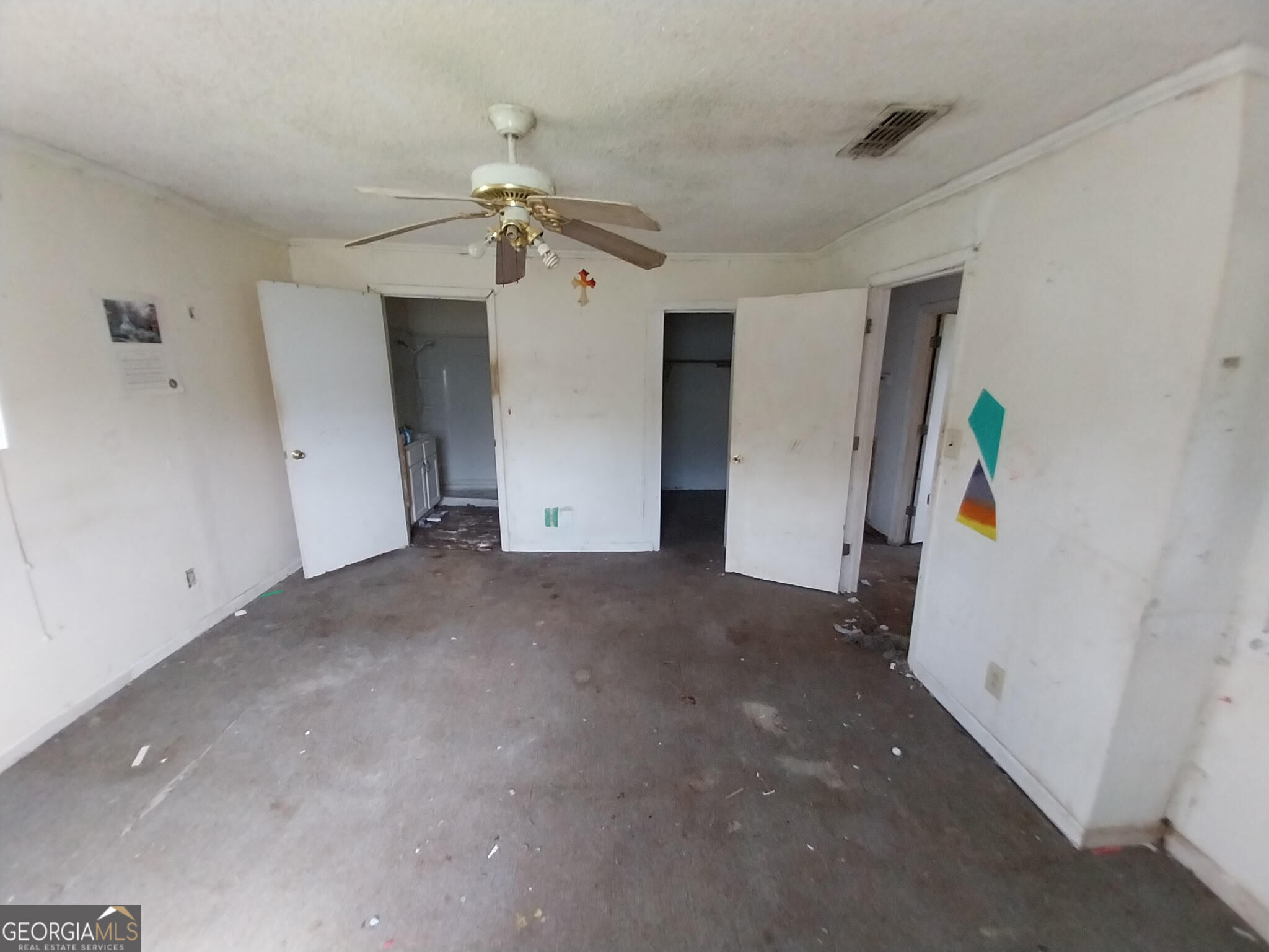152 Seaweed Road Fitzgerald, GA 31750 - Photo 4 of 4 a view of a livingroom with a ceiling fan