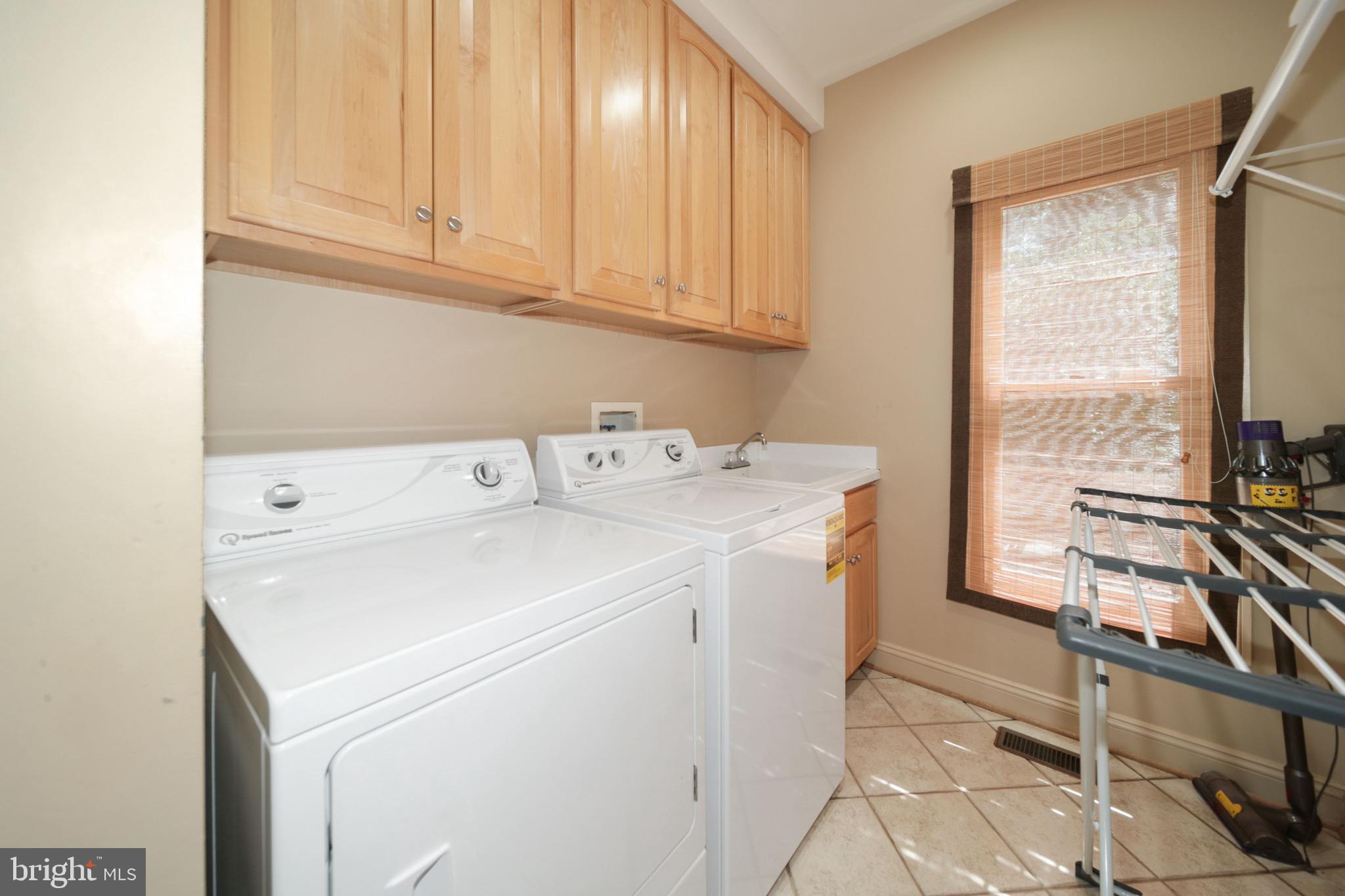 11501 Ridge Mist Terrace Potomac, MD 20854 - Photo 28 of 56 Laundry Room