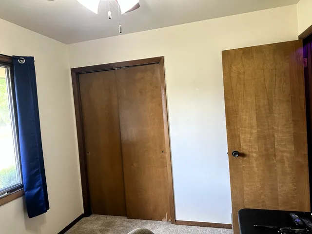 a room with furniture and window