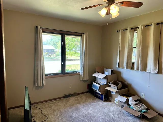 a room with window and closet