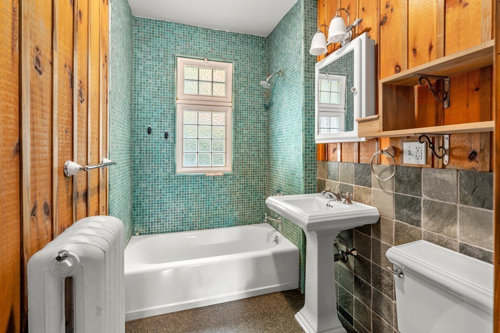 34 Weston Road Wellesley, MA 02482 - Photo 14 of 19 a bathroom with a sink a toilet and tub