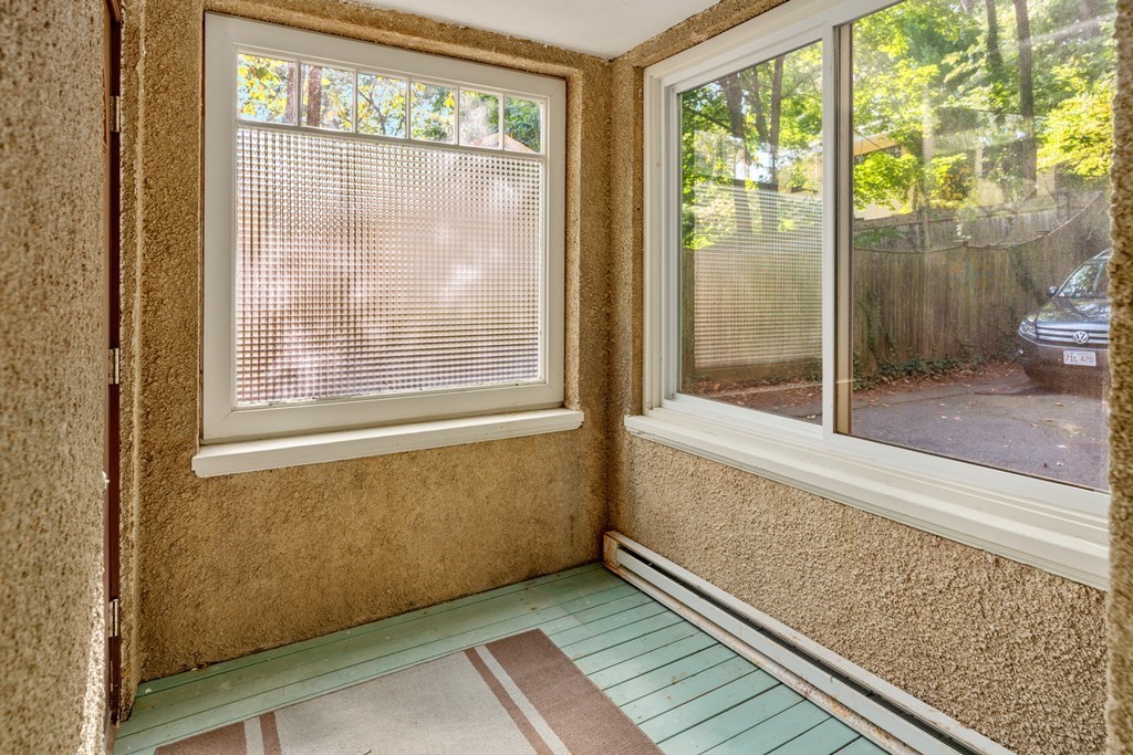 34 Weston Road Wellesley, MA 02482 - Photo 18 of 19 a view of an empty room with a window