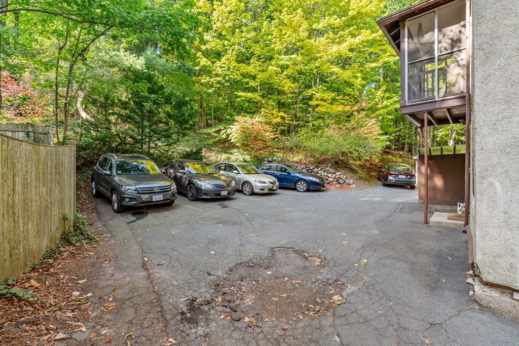 34 Weston Road Wellesley, MA 02482 - Photo 3 of 19 a view of a car parked in front of a house