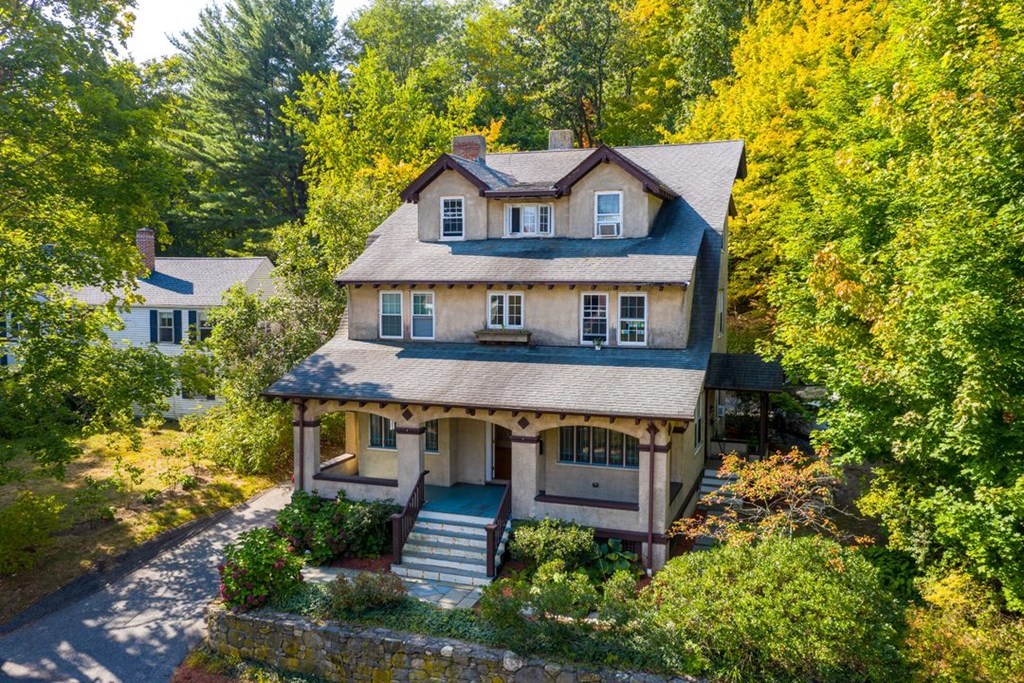 34 Weston Road Wellesley, MA 02482 - Photo 4 of 19 an aerial view of a house with a yard and potted plants