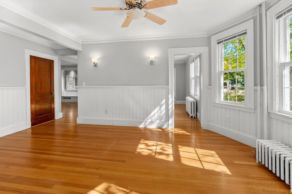 34 Weston Road Wellesley, MA 02482 - Photo 10 of 19 a view of a room with wooden floor and staircase