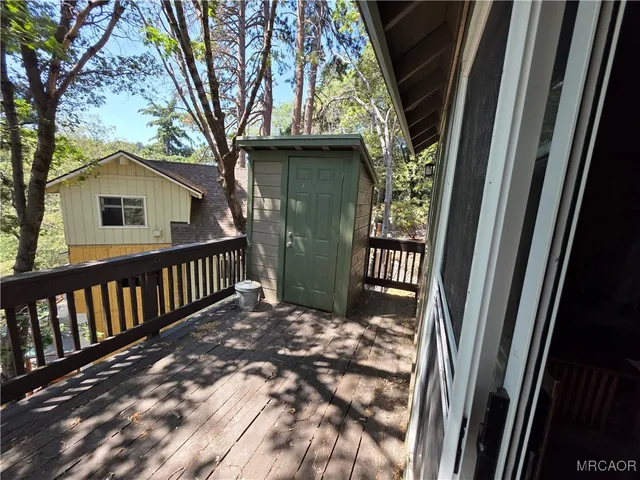 a view of a porch with a yard