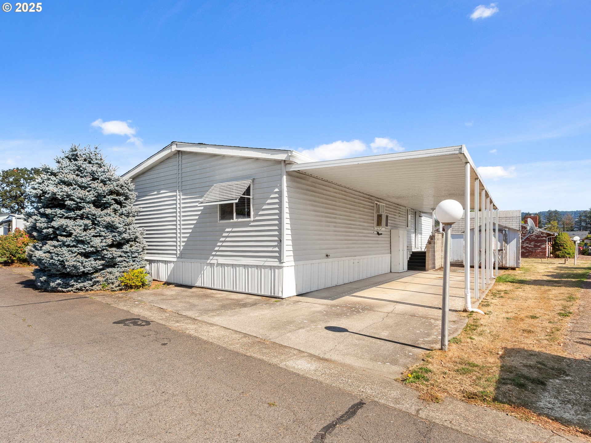 a view of a house with a street