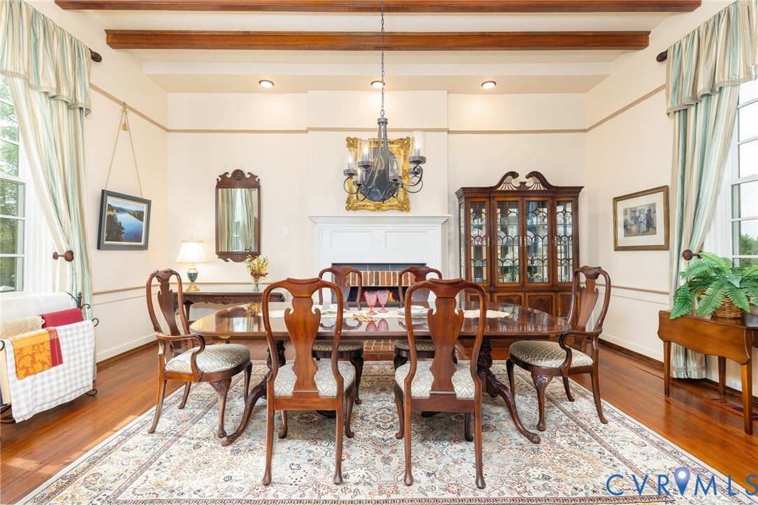 Hardwood flooring, coved ceiling with exposed beam