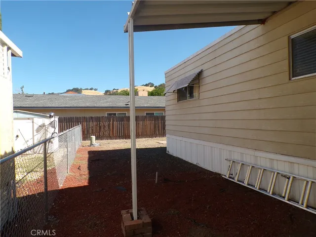 a view of balcony with furniture