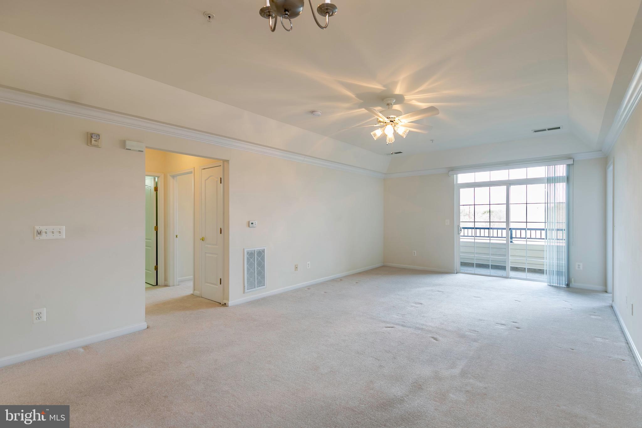 8600 Roaming Ridge Way, Unit 304 Odenton, MD 21113 - Photo 11 of 46 Living and Dining Room