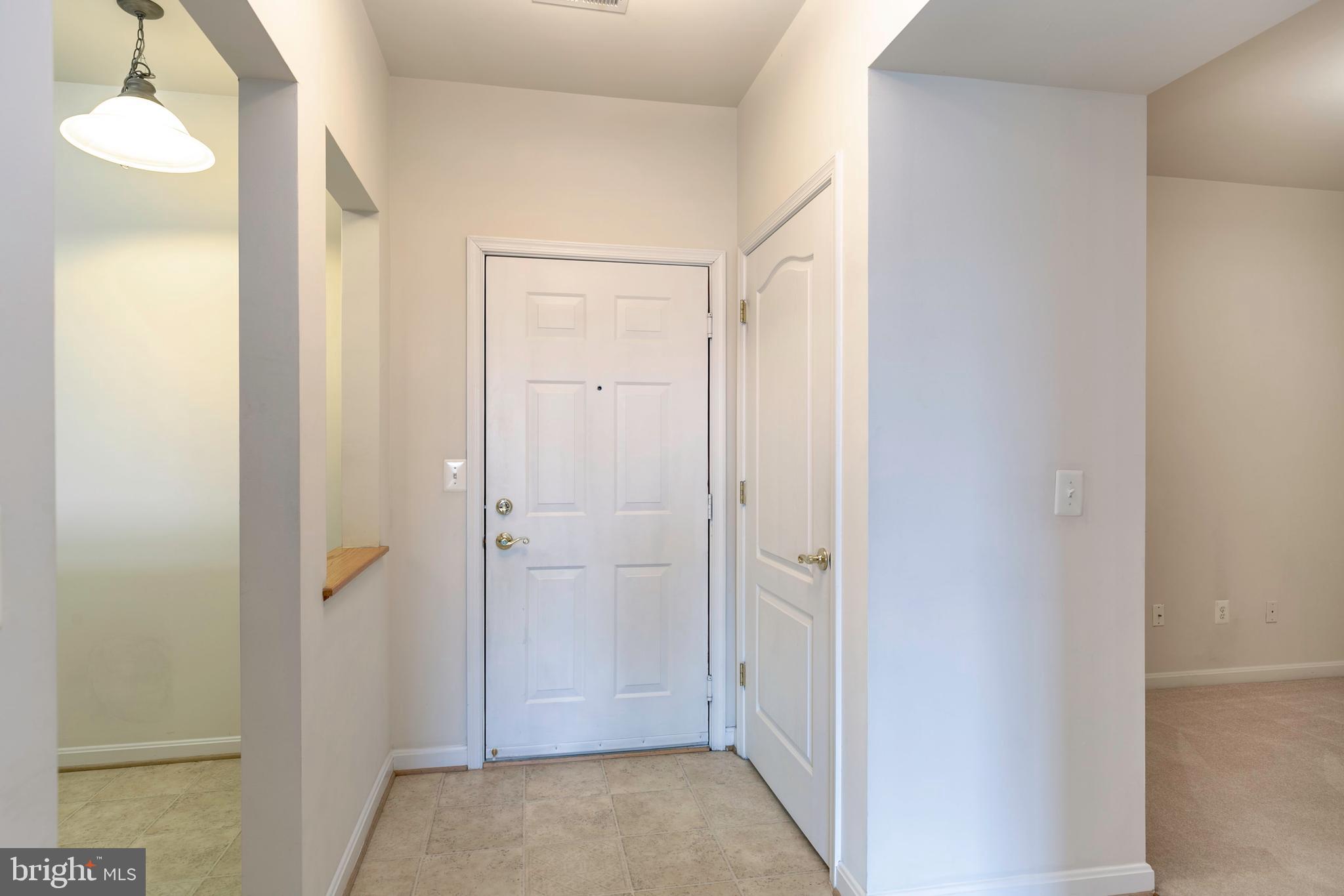 8600 Roaming Ridge Way, Unit 304 Odenton, MD 21113 - Photo 3 of 46 Foyer