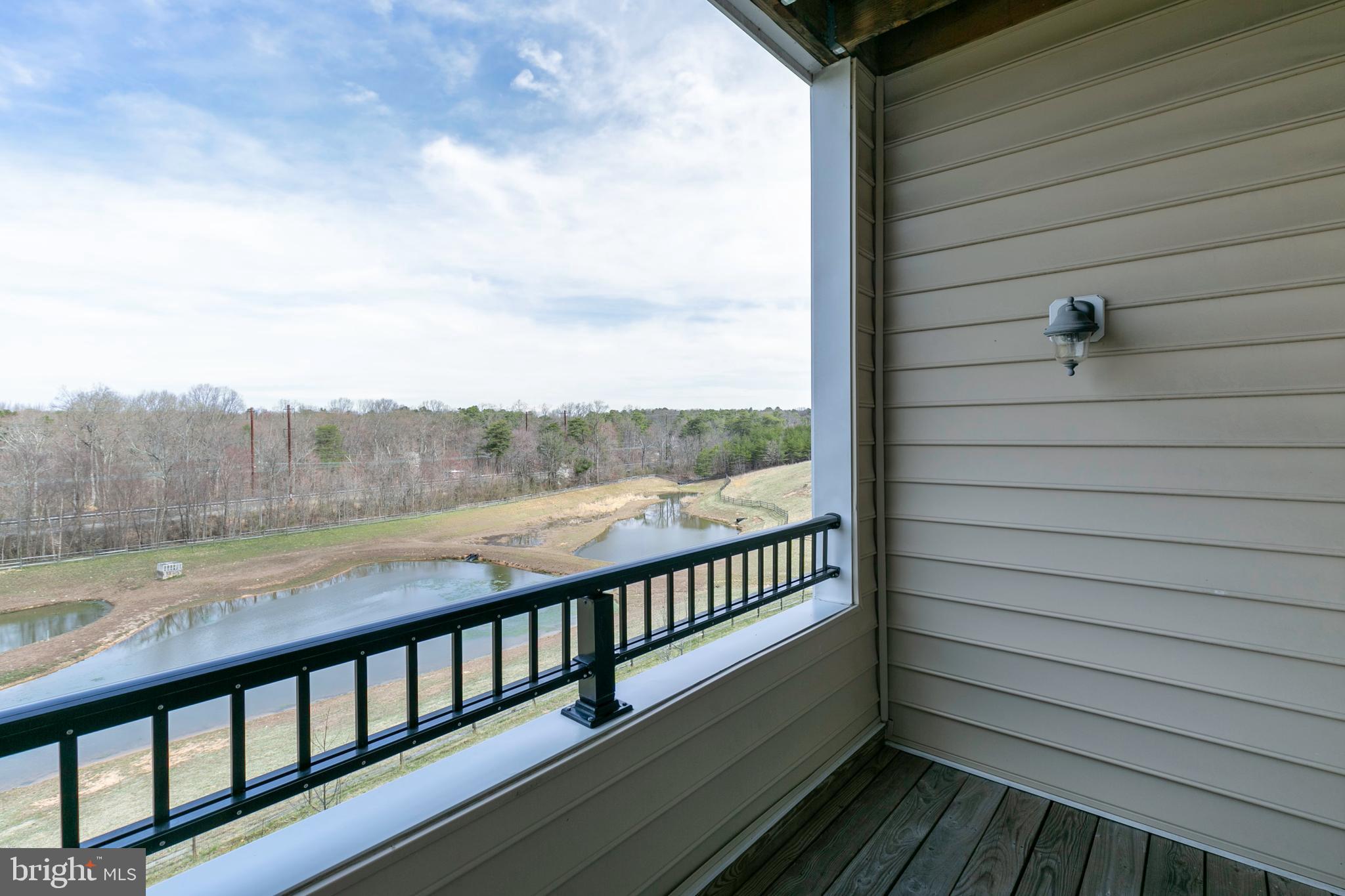 8600 Roaming Ridge Way, Unit 304 Odenton, MD 21113 - Photo 20 of 46 View from balcony