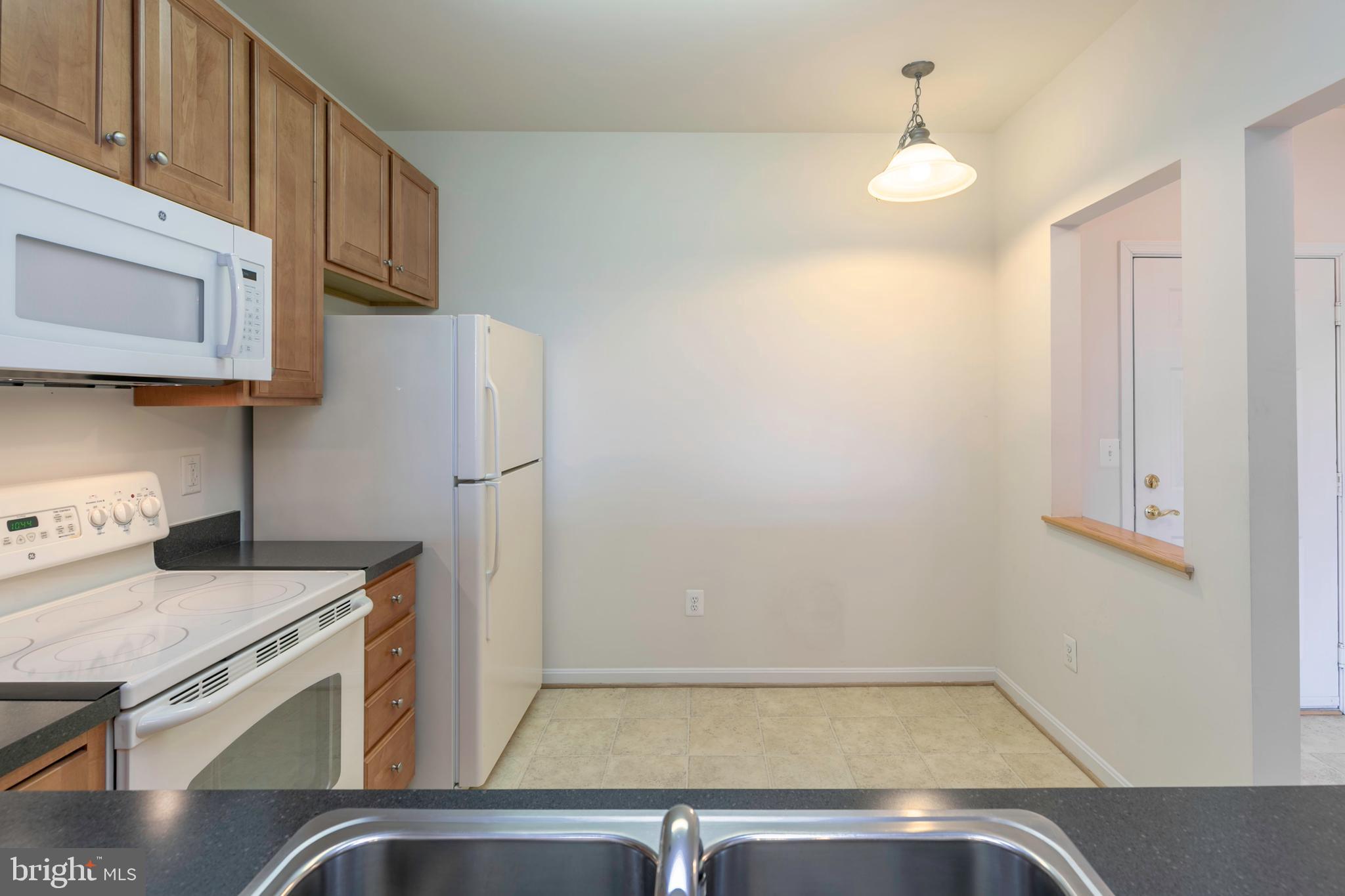 8600 Roaming Ridge Way, Unit 304 Odenton, MD 21113 - Photo 7 of 46 Kitchen