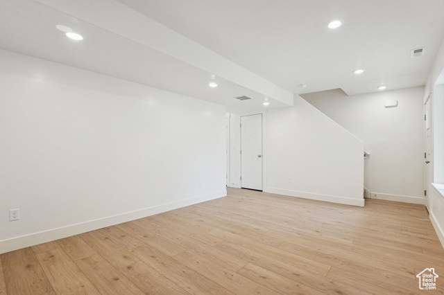 1615 North Angel Street, Unit H Layton, UT 84041 - Photo 14 of 55 Finished below grade area with light wood-style flooring and recessed lighting