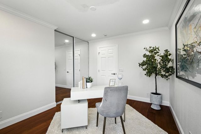 a bed room with a bed and a window