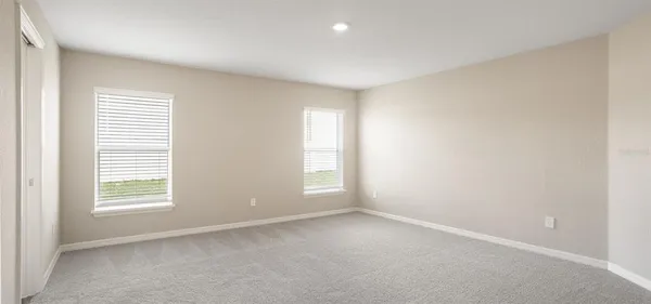 an empty room with windows