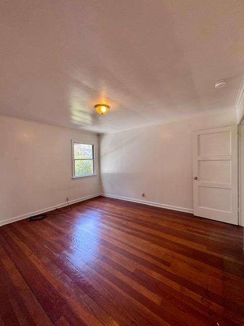 240 Pleasant Street Colfax, CA 95713 - Photo 11 of 26 an empty room with wooden floor and windows