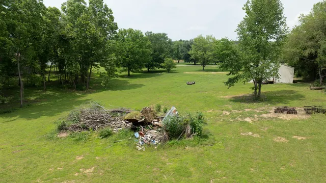 a view of a golf course with a yard
