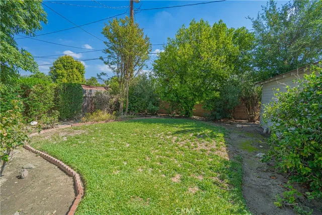 a view of a backyard with a garden