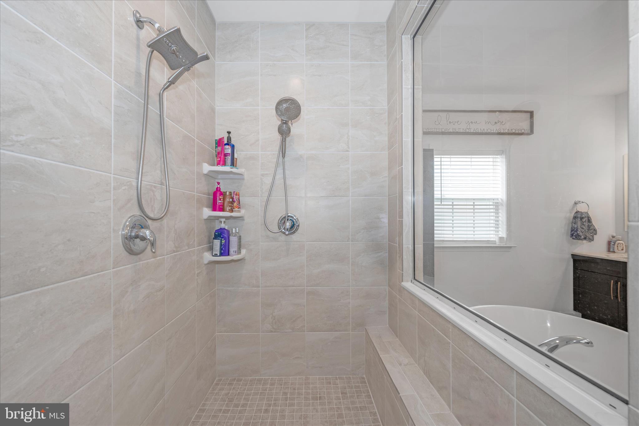 1388 Rocky Springs Road Frederick, MD 21702 - Photo 31 of 97 a bathroom with a tub and a shower