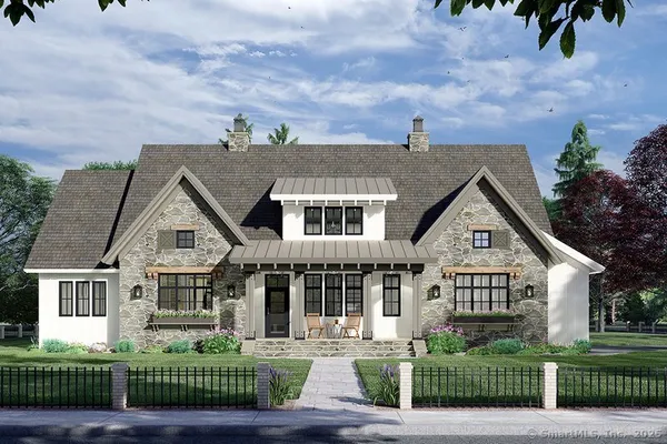 a front view of a house with a garden