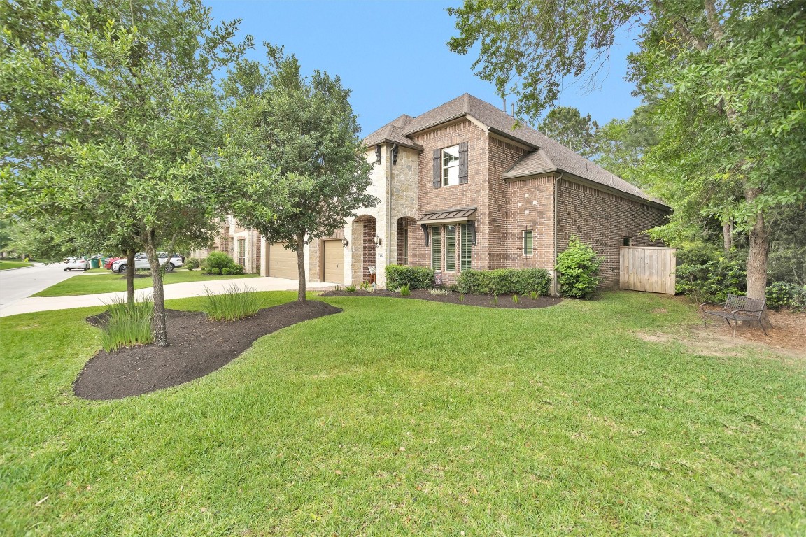 106 Cliftons Curve Way Montgomery, TX 77316 - Photo 2 of 47 Situated in a premier corner lot creates an impressive exterior